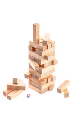 tower made of wooden blocks falling on white background
