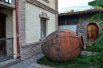 Traditional earthenware amphora Qvevri, vessel for fermentation, storage and ageing of wine in Georgia