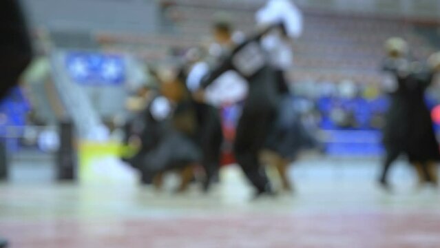 blurred background. ballroom dancing championship, standard program.