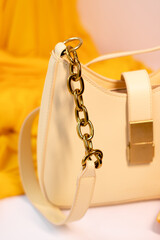 fashion photo of purse. beige woman handbag isolated on white background. Product composition photography