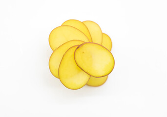 potato round slice over on white background, top view