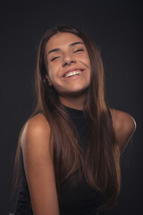 Portrait of girl laughing and posing