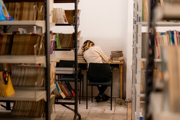 Girl reading on a desk