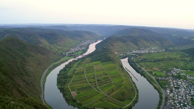 Aerial Tilt Up Scenic View Of Moselschleife Bremm Aussichtspunkt During Sunset