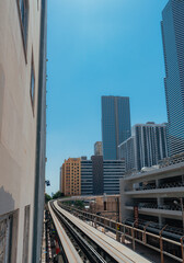 downtown city train buildings sky blue miami