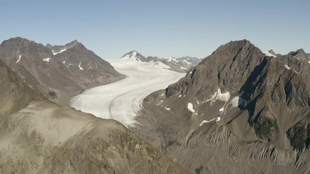 Harding Icefield Alaska Icefield glacier with snow and ice melting cause of global warming pollution, aerial view of Kenai mountains