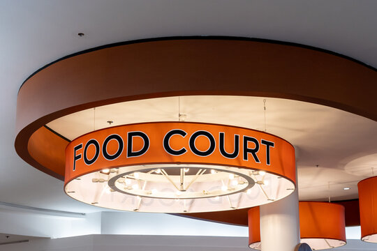  
Houston, Texas, USA - March 3, 2022: Food Court sign on the ceiling in a shopping mall. 
