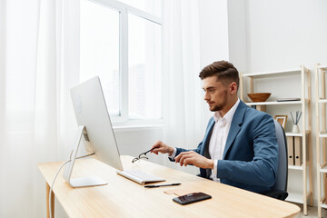 Fototapeta premium manager sitting at the computer work boss executive