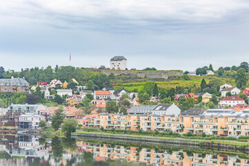 Fototapeta na wymiar view of the city of Tronheim, Norway. Nidelva river and Kristiansten fortress