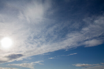 Fototapeta na wymiar cirrus clouds cover the sun. sunny day. cloudy.