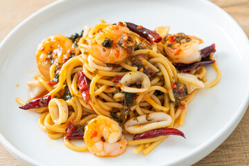 spicy spaghetti seafood on plate