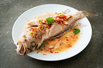 Steamed grouper fish with lime and chillies