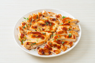grilled chicken breast sliced on plate