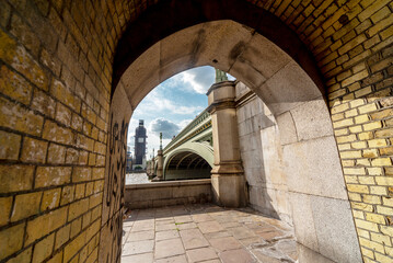 Westminster Bridge and Big Ben,seen from inside a pedestrian passageway,London,England.