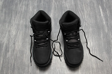 Hiking boots for men or women who want to do mountain walks with a firm anti-slip sole that gives stability and freedom of movement for adventure on vacation or weekend	