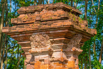 Angle Temple (Candi Sudut) functions as a complement to the main building of the Jabung Temple (Candi Jabung), which is a Buddhist temple, was founded in 1354 AD during the Majapahit kingdom.