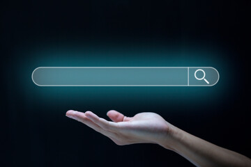 Search technology, search engine optimization, man's hand using virtual screen to search...