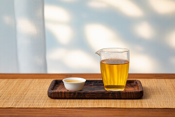 Cup of tea on wooden table.