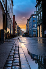 Beautiful sunset on a european narrow street in Copenhagen, Denmark 