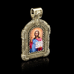 Obraz premium orthodox icon made of gold with the image of Christ on a black background