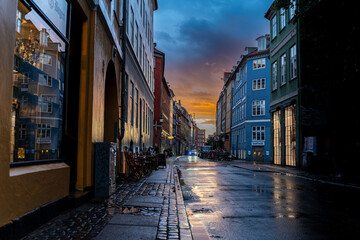 Beautiful sunset on a european narrow street in Copenhagen, Denmark 