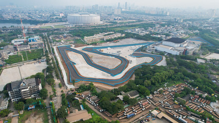 Aerial view of the Beautiful scenery of Jakarta Formula E Circuit. with Jakarta cityscape...
