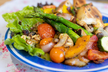 Roasted variety vegetable and beacon in restaurant