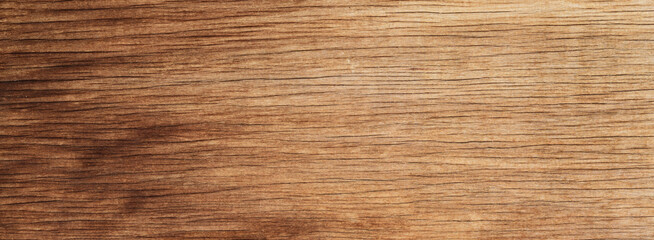 The texture of the wooden surface of a  board with natural patterns.Natural wooden background of panoramic view