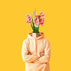 Man with bouquet of flowers instead of his head on orange background
