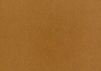 Highly detailed cardboard paper texture background fine grain caramel brown smooth uncoated corrugated fiberboard with copy space for text for material mockup or wallpaper