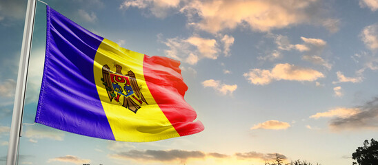 Moldova national flag cloth fabric waving on the sky - Image