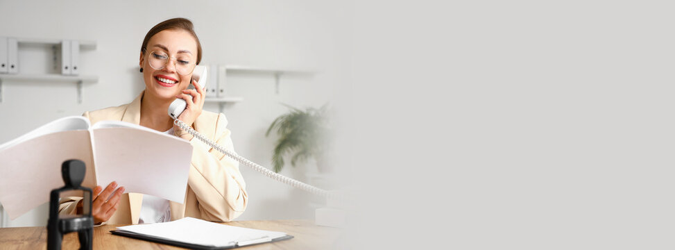 Female Notary Public Talking By Phone While Working In Office. Banner For Design With Space For Text