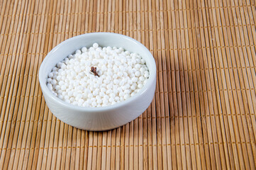 raw sagu inside a pot on the table