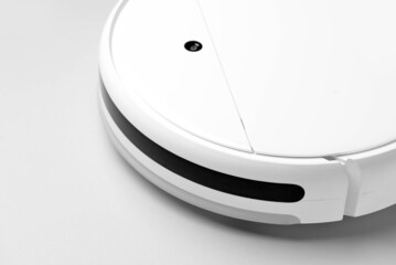 Robot vacuum cleaner on white background, closeup