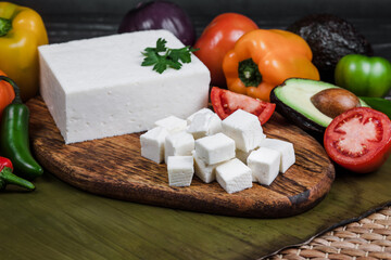 Mexican white panela cheese with fresh ingredients in Mexico Latin America	
