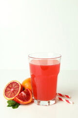 Concept of fresh drink with red orange juice, space for text