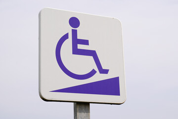 disabled accessible entry sign post with wheelchair handicap logo pmr means  people someone with reduced mobility access pictogram