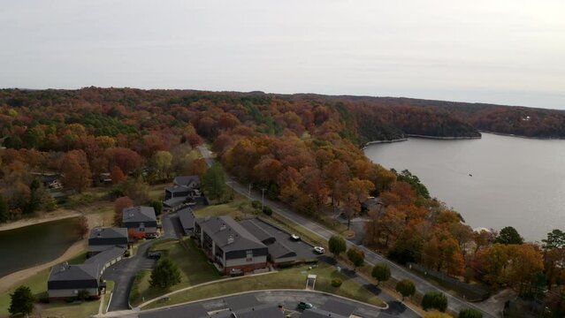 Aerial Forward Shot Of Rental Cabins At Hobbs State Park In Beaver Lake - Rogers, Arkansas