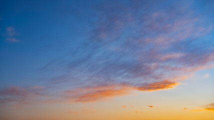 Dramatic sky with orange clouds. Nature background.