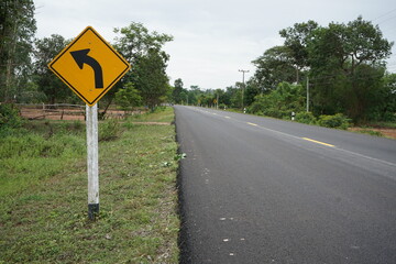 left curve warning sign for travel safety