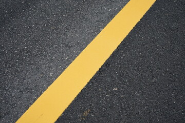 Fototapeta premium yellow road marking color Used in the background of advertising media, transportation systems.