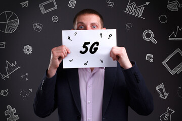 Business, technology, internet and network concept. Young businessman thinks over the steps for successful growth: 5G