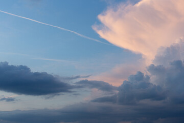 Naklejka na ściany i meble Picture dramatic clouds just before sunset. Landscape size.