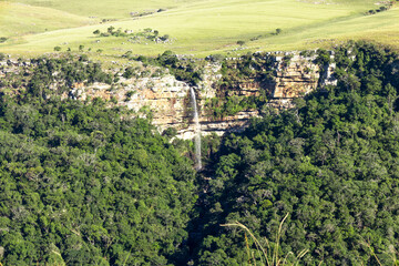 Fototapeta na wymiar waterfall into gorge forest