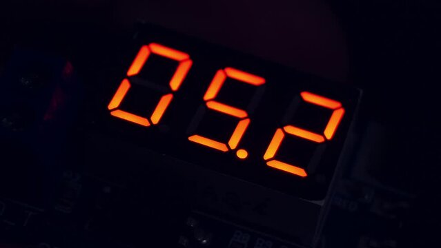 Countdown timer. 10 Seconds. Red digital scale. Decimals. One tenth of a second. The concept of growing danger