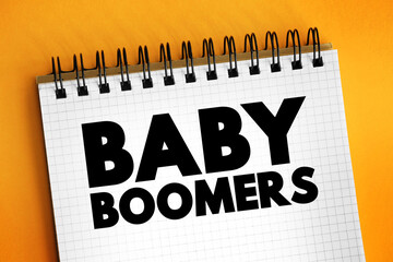 Baby boomers - demographic cohort following the Silent Generation and preceding Generation X, text concept on notepad