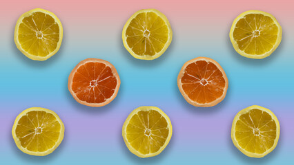 Lemons and oranges wedges on pink background
