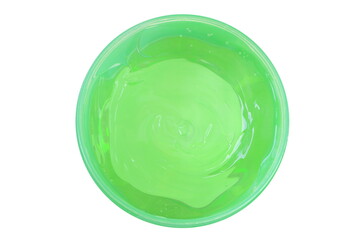 Close up green gel cream (aloe vera gel) in plastic container isolated on white background, top view (flat lay).