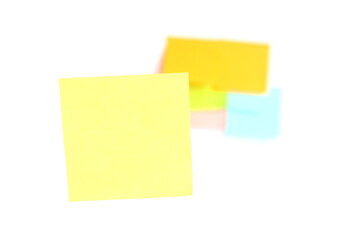 yellow post it have another colorful post it at the back on white background