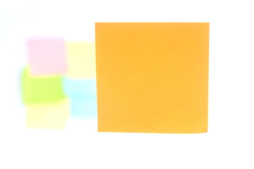 close up orange post it on white background have copy space for put text